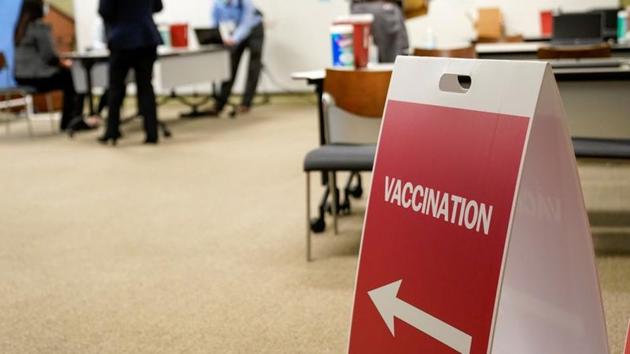 A sign directs healthcare workers to a rehearsal for the administration of the Pfizer coronavirus disease (Covid-19) vaccine at Indiana University Health in Indianapolis, Indiana, US on December 11, 2020. (Reuters File Photo) A sign directs healthcare workers to a rehearsal for the administration of the Pfizer coronavirus disease (Covid-19) vaccine at Indiana University Health in Indianapolis, Indiana, US on December 11, 2020. (Reuters File Photo)