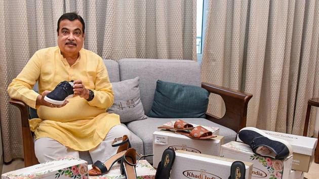 Union Minister for MSME Nitin Gadkari takes a look at high quality Khadi fabric footwear, designed by Khadi and Village Industries Commission (KVIC).(PTI/ File photo) Union Minister for MSME Nitin Gadkari takes a look at high quality Khadi fabric footwear, designed by Khadi and Village Industries Commission (KVIC).(PTI/ File photo)