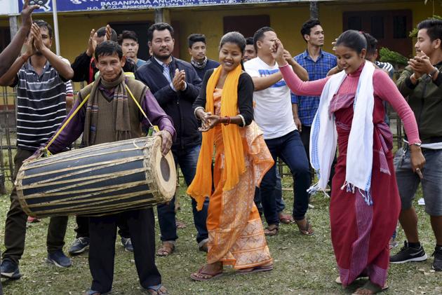 Activists of United People's Party Liberal (UPPL) celebrate the BTC poll results, at Baganpara in Baksa district of Assam on Sunday.(PTI)