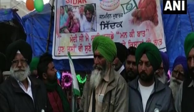 Farmer celebrates his daughter’s 1st birthday at Tikri border amid ongoing agitation. (Photo via ANI twitter) Farmer celebrates his daughter’s 1st birthday at Tikri border amid ongoing agitation. (Photo via ANI twitter)