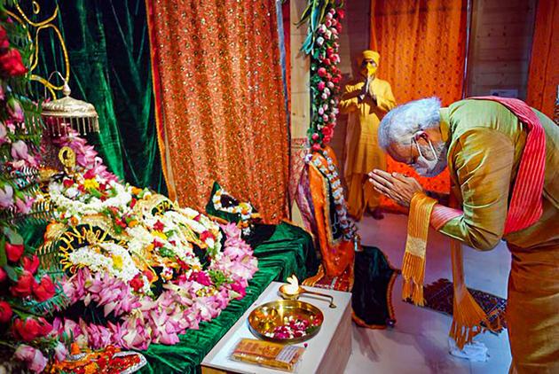 Prime Minister Narendra Modi offers prayers while attending the foundation stone laying ceremony for the construction of the Ram mandir in Ayodhya on August 5, 2020. (PTI (Twitter image posted by @narendramodi)) Prime Minister Narendra Modi offers prayers while attending the foundation stone laying ceremony for the construction of the Ram mandir in Ayodhya on August 5, 2020. (PTI (Twitter image posted by @narendramodi))