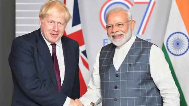 Prime Minister Narendra Modi shakes hands with UK PM Boris Johnson(Photo courtesy: PIB)) Prime Minister Narendra Modi shakes hands with UK PM Boris Johnson(Photo courtesy: PIB))