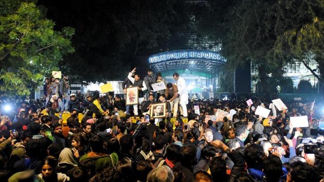 The police shut at least 16 Metro stations and several roads across Delhi to prevent students from gathering at venues such as the police headquarters. A large group, however, collected outside the Delhi Police headquarters near ITO around 9pm on December 15 to protest the force’s handling of the situation. They raised anti-police slogans in an agitation call by the Jawaharlal Nehru University (JNU) students’ union and other students’ bodies. (Amal KS / HT Photo)