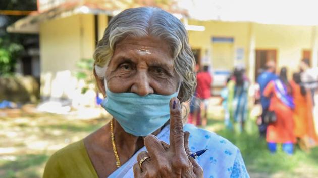 A woman shows her fingers marked with indelible ink after casting vote during the first phase of Kerala local body elections, in Alappuzha district, Tuesday. (PTI) A woman shows her fingers marked with indelible ink after casting vote during the first phase of Kerala local body elections, in Alappuzha district, Tuesday. (PTI)