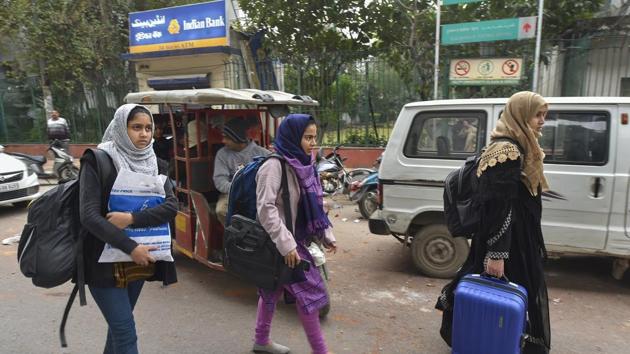 Students leave the university on December 16. Students of Maulana Azad National Urdu University (MANUU), in Hyderabad, Banaras Hindu University (BHU) in Varanasi and Kolkata’s Jadavpur University also held demonstrations in solidarity with the Jamia students. (Kamal Kishore / PTI)