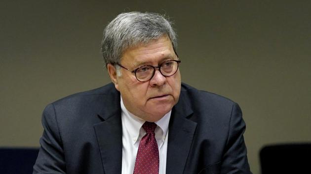 Attorney General William Barr meets with members of the St. Louis Police Department in St. Louis. Barr has announced he is resigning. (AP Photo/Jeff Roberson, Pool)