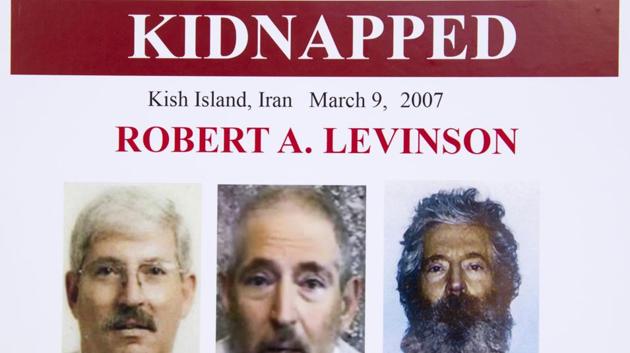 In this March 6, 2012, file photo, an FBI poster showing a composite image of former agent Robert Levinson. At right, is a photo of how he would look like after five years in captivity, and an image, center, taken from the video, released by his kidnappers, and a picture before he was kidnapped, left, displayed during a news conference in Washington. (AP Photo/Manuel Balce Ceneta, File) In this March 6, 2012, file photo, an FBI poster showing a composite image of former agent Robert Levinson. At right, is a photo of how he would look like after five years in captivity, and an image, center, taken from the video, released by his kidnappers, and a picture before he was kidnapped, left, displayed during a news conference in Washington. (AP Photo/Manuel Balce Ceneta, File)