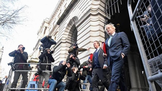 British Prime Minister Boris Johnson and Secretary of State for Scotland Alister Jack return to 10 Downing Street after a cabinet meeting at the Foreign and Commonwealth Office (FCO) in London, Britain. (Reuters) British Prime Minister Boris Johnson and Secretary of State for Scotland Alister Jack return to 10 Downing Street after a cabinet meeting at the Foreign and Commonwealth Office (FCO) in London, Britain. (Reuters)