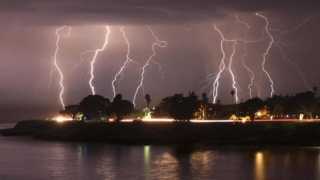 A rare lightning storm crackles over Mitchell's Cove in early morning in Santa Cruz, Calif. The severe storm system rolled through the San Francisco and Monterey Bay areas in August, packing a combination of dry lightning and high winds that triggered wildfires throughout the region.(AP)