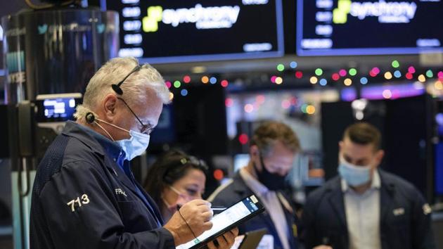 In the US, S&P 500 futures were higher and the dollar weakened as investors waited for details from the Federal Reserve’s recent meeting.(AP file photo) In the US, S&P 500 futures were higher and the dollar weakened as investors waited for details from the Federal Reserve’s recent meeting.(AP file photo)
