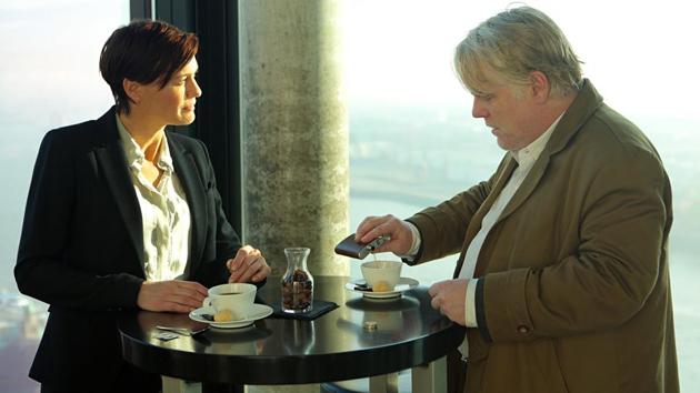 Director Anton Corbijn’s adaptation of the rather low-key John le Carré novel will always be viewed with a tinge of melancholy. It served as the final starring role of Philip Seymour Hoffman’s career. In many ways, his Gunther Bachmann – a jaded German on the hunt for a Chechen terrorist – was a version of the Smiley school of spies that le Carré had perfected; plump, unkempt and unhappy. (Courtesy Demarest Films ) Director Anton Corbijn’s adaptation of the rather low-key John le Carré novel will always be viewed with a tinge of melancholy. It served as the final starring role of Philip Seymour Hoffman’s career. In many ways, his Gunther Bachmann – a jaded German on the hunt for a Chechen terrorist – was a version of the Smiley school of spies that le Carré had perfected; plump, unkempt and unhappy. (Courtesy Demarest Films )