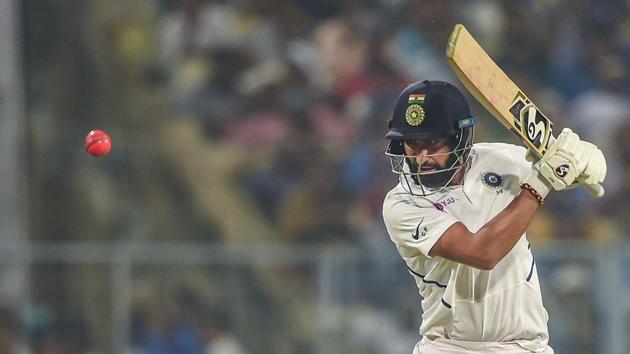 File photo of Indian batsman Cheteshwar Pujara playing a shot during the 1st pink-ball day/night cricket test match in India (PTI) File photo of Indian batsman Cheteshwar Pujara playing a shot during the 1st pink-ball day/night cricket test match in India (PTI)