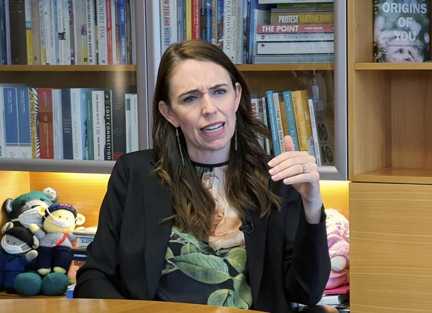 New Zealand's Prime Minister Jacinda Ardern is interviewed in her office at the parliament in Wellington, Wednesday, Dec. 16, 2020(AP Photo/Sam James)