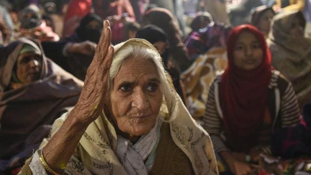 Demonstrators at Shaheen Bagh on December 30, 2019. As the protest grew, people from across the city made their way to Shaheen Bagh. They came to spend time with the grand old women of Shaheen Bagh, the Dadis or grandmothers who stayed put in the biting winter. In September this year, 82-year-old Bilkis, one of the women, was named one of the 100 most influential people of 2020 by Time magazine. (Burhaan Kinu / HT Archive)