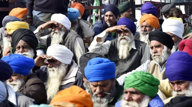 Farmers congregate during a protest against the new farm laws, at Singhu (Delhi-Haryana border) near New Delhi, India, on Wednesday.(Ajay Aggarwal /HT PHOTO)