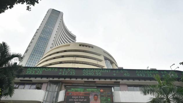 A screen on the facade of BSE building displays stock prices. (PTI) A screen on the facade of BSE building displays stock prices. (PTI)