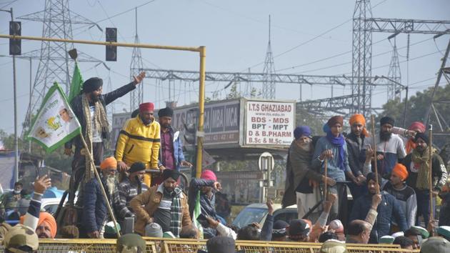 Demonstrators near police barricading at the Ghazipur protest site near the Delhi-UP border, in New Delhi on Thursday. (Sakib Ali/HT photo) Demonstrators near police barricading at the Ghazipur protest site near the Delhi-UP border, in New Delhi on Thursday. (Sakib Ali/HT photo)