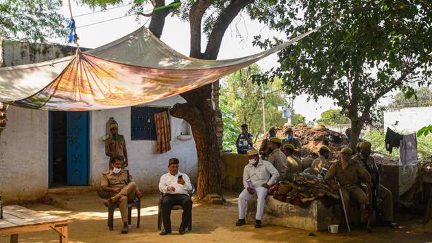 Police personnel deployed near the house of the victim in Hathras in October. (File photo : Amal KS/ Hindustan Times)(Amal KS/HT PHOTO)