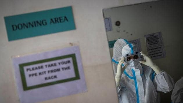 Medical workers wear personal protective equipment (PPE) as they get ready to treat patients suffering from the coronavirus disease (Covid-19), at the Max Smart Super Speciality Hospital in New Delhi.(REUTERS) Medical workers wear personal protective equipment (PPE) as they get ready to treat patients suffering from the coronavirus disease (Covid-19), at the Max Smart Super Speciality Hospital in New Delhi.(REUTERS)