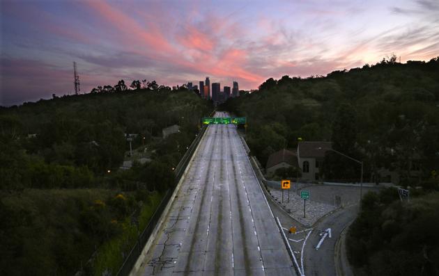 Empty lanes of the 110 Arroyo Seco Parkway lead to downtown Los Angeles during the coronavirus outbreak.(AP)