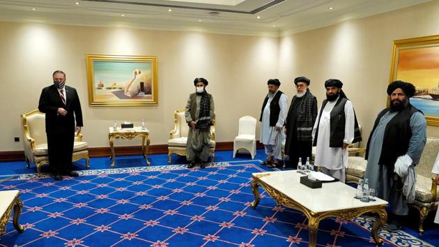 US Secretary of State, Mike Pompeo, meets with Taliban chief negotiator, Mullah Abdul Ghani Baradar, and Taliban's peace negotiation team, amid talks between the Taliban and the Afghan government, in Doha, Qatar November 2020. (REUTERS FILE PHOTO) US Secretary of State, Mike Pompeo, meets with Taliban chief negotiator, Mullah Abdul Ghani Baradar, and Taliban's peace negotiation team, amid talks between the Taliban and the Afghan government, in Doha, Qatar November 2020. (REUTERS FILE PHOTO)