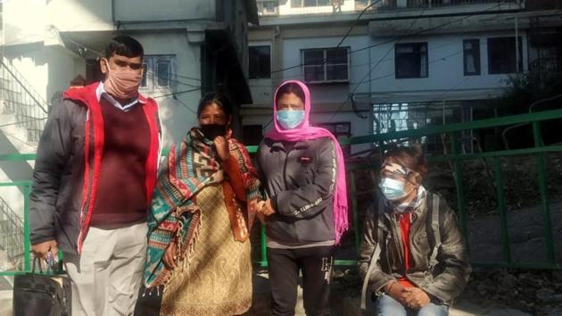 Police officer from anti-human trafficking cell of Haryana Police with the woman in Shimla onSaturday. (Deepak Sansta/HT) Police officer from anti-human trafficking cell of Haryana Police with the woman in Shimla onSaturday. (Deepak Sansta/HT)
