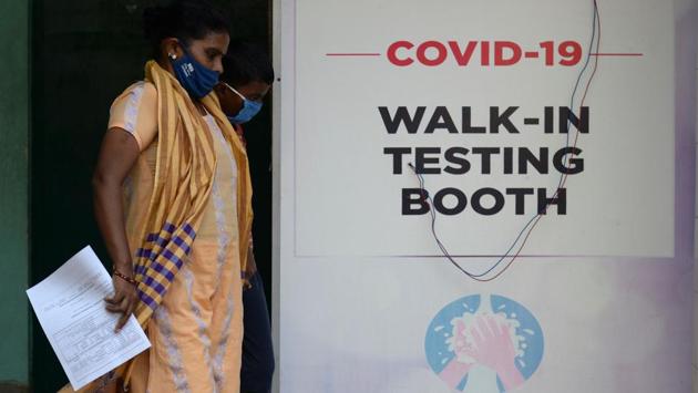 A boy along with his mother arrives at a Covid-19 testing centre in Chennai on December 19. The United States, with a population a quarter the size of India’s, has been reporting upwards of 200,000 new cases in recent weeks, 10 times as many as India, AFP reported. India’s fatality rate is also considerably lower -- less than half that of the US. Brazil has also reported more deaths at 185,000. (Arun Sankar / AFP) 