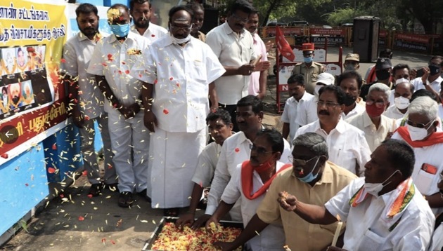 Puducherry chief minister V Narayanasamy and his cabinet colleagues on Sunday paid homage to the farmers who died during the ongoing agitations in Delhi and other parts of the country(V Narayanasamy on Twitter)
