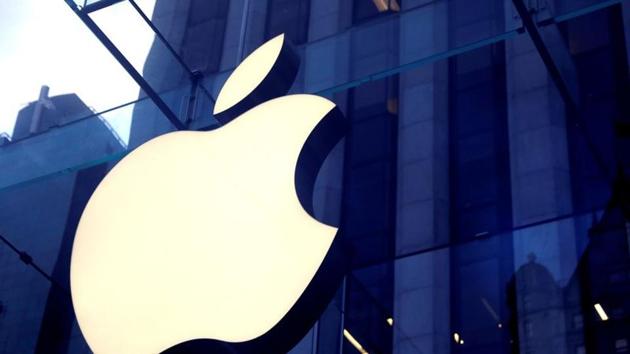 The Apple Inc logo is seen hanging at the entrance to the Apple store on 5th Avenue in Manhattan, New York, US. (Reuters)