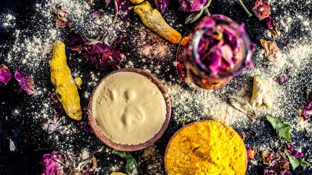 Ayurvedic ubtan of turmeric/haldi and mulpani mitti or fullerâ??s earth with rose water on a black surface for good skin and brighter skin with no acnes and pimple free. (HT Archive) Ayurvedic ubtan of turmeric/haldi and mulpani mitti or fullerâ??s earth with rose water on a black surface for good skin and brighter skin with no acnes and pimple free. (HT Archive)