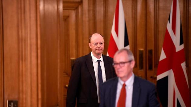 Chris Whitty, the chief medical officer for England and Patrick Vallance, UK government chief scientific adviser arrive to attend a news conference with Britain's Prime Minister Boris Johnson, in response to the ongoing situation with the coronavirus disease (Covid-19) pandemic, inside 10 Downing Street, London ,Britain. (Reuters)