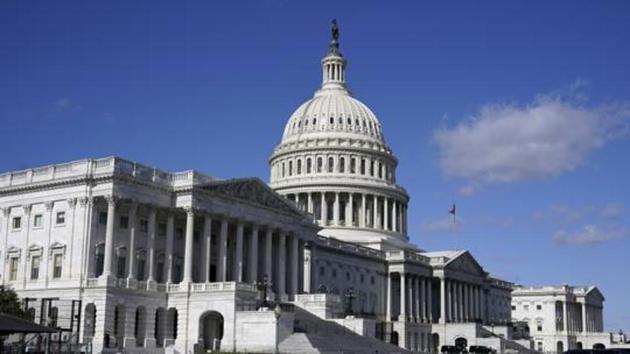 Congressional leaders plan to attach the coronavirus aid package to a $1.4 trillion spending bill funding government programs through September 2021. (AP) Congressional leaders plan to attach the coronavirus aid package to a $1.4 trillion spending bill funding government programs through September 2021. (AP)