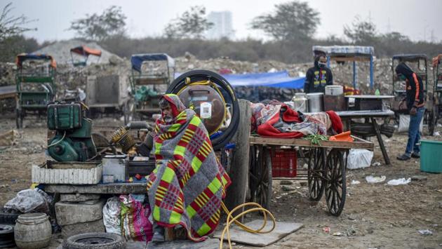 A man with a blanket wrapped around himself seen near Ghazipur market in New Delhi on December 17. “Cold wave conditions are likely to persist over Delhi for a few days. Cold day conditions have abated in most parts of northwest India which means there is clear sunshine, which is able to warm the surface. The layer of fog has moved away,” Kuldeep Srivastava, head of the regional weather forecasting centre told HT. (Biplov Bhuyan / HT Photo) A man with a blanket wrapped around himself seen near Ghazipur market in New Delhi on December 17. “Cold wave conditions are likely to persist over Delhi for a few days. Cold day conditions have abated in most parts of northwest India which means there is clear sunshine, which is able to warm the surface. The layer of fog has moved away,” Kuldeep Srivastava, head of the regional weather forecasting centre told HT. (Biplov Bhuyan / HT Photo)