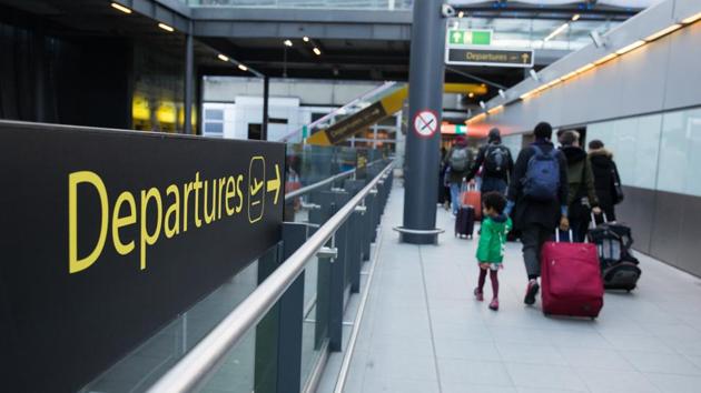 Passengers pull luggage after disembarking an inter-terminal train at London Gatwick Airport Ltd. in Crawley on December 19. Germany, the Netherlands, Belgium, Austria and Italy all announced restrictions on UK travel, hours after Britain announced its latest stay at home orders. (Chris Ratcliffe / Bloomberg) Passengers pull luggage after disembarking an inter-terminal train at London Gatwick Airport Ltd. in Crawley on December 19. Germany, the Netherlands, Belgium, Austria and Italy all announced restrictions on UK travel, hours after Britain announced its latest stay at home orders. (Chris Ratcliffe / Bloomberg)
