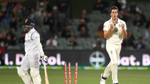 Australian bowler Pat Cummins reacts after dismissing Indian batsman Prithvi Shaw.(via REUTERS)