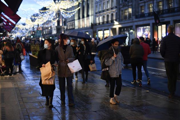 As the British prime minister was detailing the new restrictions for London and southeast England on Saturday, negotiators in Brussels were inching closer toward an agreement.(AP) As the British prime minister was detailing the new restrictions for London and southeast England on Saturday, negotiators in Brussels were inching closer toward an agreement.(AP)