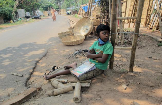 A child outside his home in Bhubaneshwar during the ongoing COVID-19 pandemic. (NurPhoto via Getty Images) A child outside his home in Bhubaneshwar during the ongoing COVID-19 pandemic. (NurPhoto via Getty Images)
