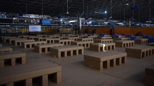 Unoccupied cardboard beds seen inside Sardar Patel Covid Care Center in New Delhi on December 19. The drop in cases and deaths and the consistent low positivity rate come even as the state government continued to conduct around or over 80,000 Covid-19 tests per day, HT reported. (Ajay Aggarwal / HT Photo) Unoccupied cardboard beds seen inside Sardar Patel Covid Care Center in New Delhi on December 19. The drop in cases and deaths and the consistent low positivity rate come even as the state government continued to conduct around or over 80,000 Covid-19 tests per day, HT reported. (Ajay Aggarwal / HT Photo)