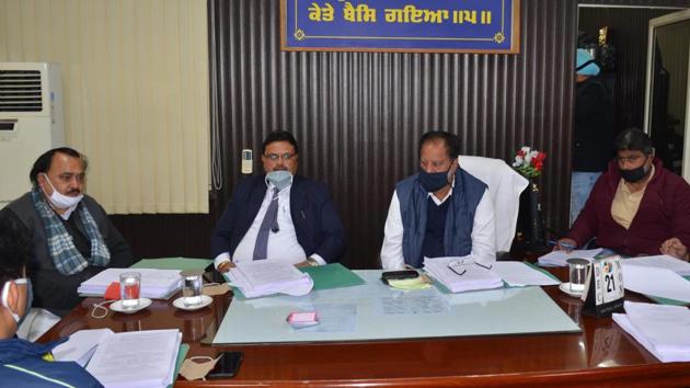 Mayor Balkar Singh Sandhu addressing the finance and contracts committee (F&CC) meeting at his camp office in Ludhiana on Monday. (Harsimar Pal Singh/HT) Mayor Balkar Singh Sandhu addressing the finance and contracts committee (F&CC) meeting at his camp office in Ludhiana on Monday. (Harsimar Pal Singh/HT)