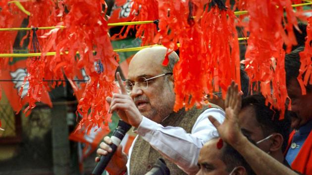 Union home minister Amit Shah during a roadshow ahead of West Bengal assembly polls 2021, at Bolpur in Birbhum district on December 20, 2020. (PTI Photo) Union home minister Amit Shah during a roadshow ahead of West Bengal assembly polls 2021, at Bolpur in Birbhum district on December 20, 2020. (PTI Photo)