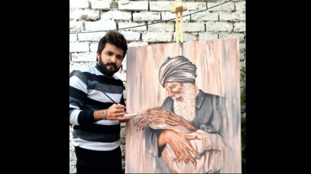 The image shows one of the artists, Ravi Ravraj with a painting.(Twitter/@ravi.ravraj) The image shows one of the artists, Ravi Ravraj with a painting.(Twitter/@ravi.ravraj)