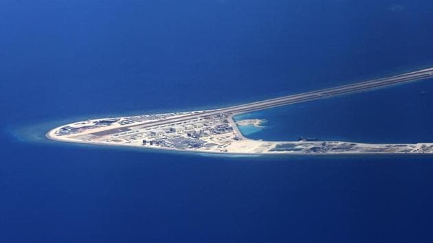 In this April 21, 2017, file photo, Chinese structures and an airstrip on the man-made Subi Reef at the Spratlys group of islands are seen from a Philippine Air Force C-130 transport plane off the disputed South China Sea in western Philippines.(AP/ FILE)