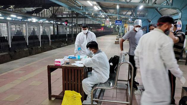 Covid-19 tests being administered to passengers arriving from Delhi, Goa, Rajasthan and Gujarat, at a railway station in Mumbai. (ANI) Covid-19 tests being administered to passengers arriving from Delhi, Goa, Rajasthan and Gujarat, at a railway station in Mumbai. (ANI)