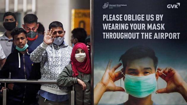 People waiting for inbound travellers to arrive at Chhatrapati Shivaji Maharaj International Airport in Mumbai on December 22. India has joined the growing list of countries that have sealed off access to people who have been to the UK, suspending all flights to and from the country between December 23 and December 31 in order to stop the arrival of the new strain. (Francis Mascarenhas / REUTERS) People waiting for inbound travellers to arrive at Chhatrapati Shivaji Maharaj International Airport in Mumbai on December 22. India has joined the growing list of countries that have sealed off access to people who have been to the UK, suspending all flights to and from the country between December 23 and December 31 in order to stop the arrival of the new strain. (Francis Mascarenhas / REUTERS)