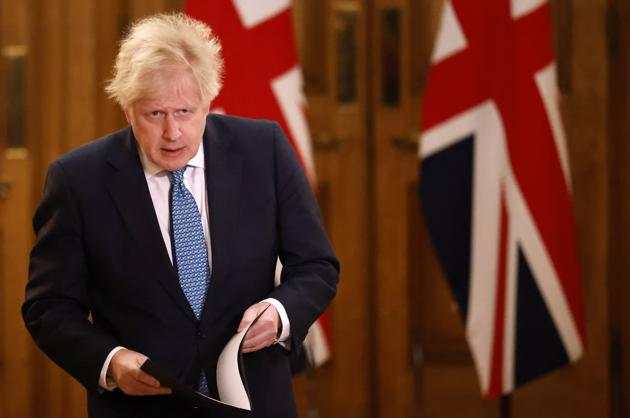 Britain’s PM Boris Johnson said he’d spoken with French President Emmanuel Macron while Transport Secretary Grant Shapps had been in talks with his counterpart. (AP)