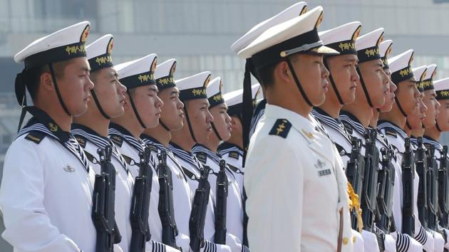 In this January 17, 2019, file photo, Chinese People's Liberation Navy sailors stand in formation on the deck of a type 054A guided missile frigate Wuhu as it docks at Manila's South Harbour for a four-day port call in Manila, Philippines.(AP/ FILE)