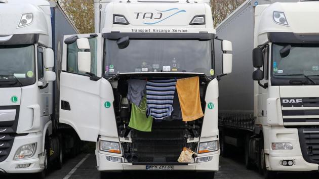 Clothes and towels hang to dry on a lorry at Ashford International Truck Stop, as EU countries impose a travel ban from the UK.(REUTERS) Clothes and towels hang to dry on a lorry at Ashford International Truck Stop, as EU countries impose a travel ban from the UK.(REUTERS)
