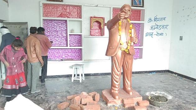 Morena district collector says the idol of Dr B R Ambedkar has been installed overnight in an illegally constructed house on Wednesday to save it from demolition. (HT Photo) Morena district collector says the idol of Dr B R Ambedkar has been installed overnight in an illegally constructed house on Wednesday to save it from demolition. (HT Photo)