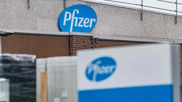 A picture shows the company logo at the US pharmaceutical giant Pfizer plant in Puurs, northeast Belgium, on December 23, 2020.(AFP) A picture shows the company logo at the US pharmaceutical giant Pfizer plant in Puurs, northeast Belgium, on December 23, 2020.(AFP)