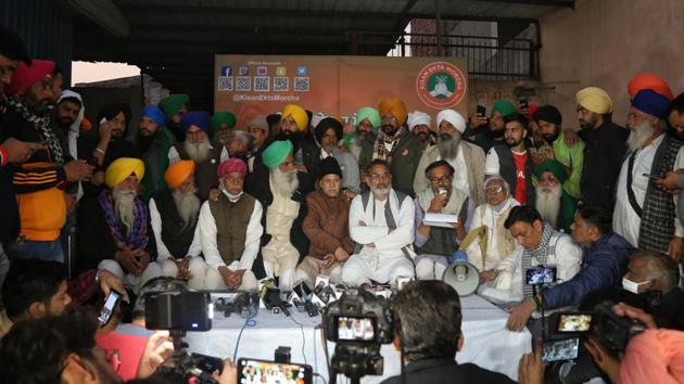 Members of farmer unions address a press conference over the decision taken in their meeting to reply to government’s draft sent to them over the new farm laws, at Singhu border near New Delhi on December 23. As the protest completes a month on December 27, farmer bodies have held several talks with the Union government over time but no concrete solution has been arrived at yet. (Sanchit Khanna / HT Photo) Members of farmer unions address a press conference over the decision taken in their meeting to reply to government’s draft sent to them over the new farm laws, at Singhu border near New Delhi on December 23. As the protest completes a month on December 27, farmer bodies have held several talks with the Union government over time but no concrete solution has been arrived at yet. (Sanchit Khanna / HT Photo)